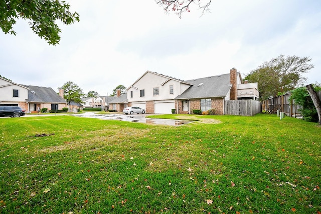 view of yard with a garage