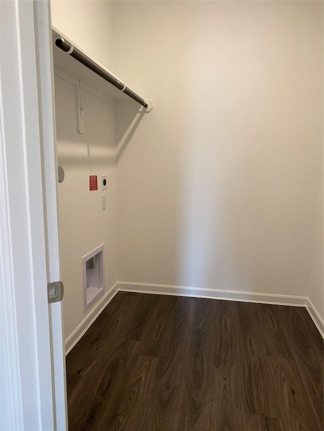 clothes washing area with dark hardwood / wood-style floors and hookup for an electric dryer