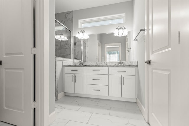 bathroom with vanity and an enclosed shower