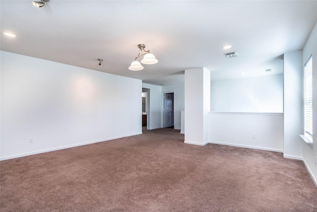 empty room with carpet floors