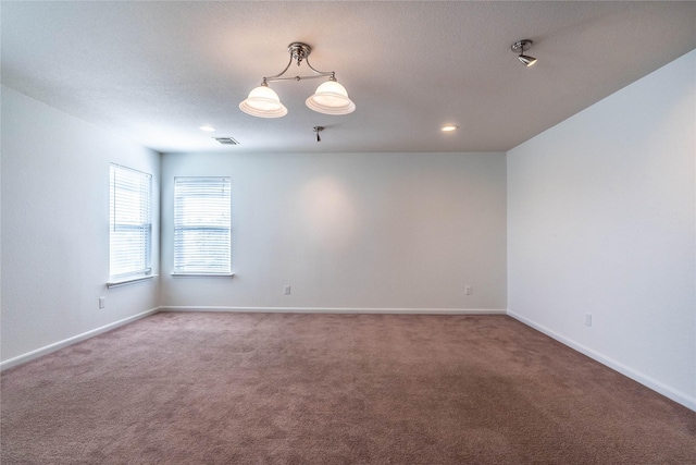 empty room with carpet floors