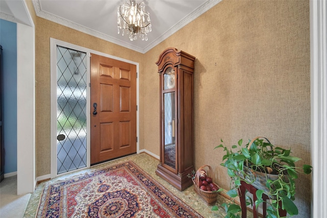 entrance foyer with crown molding and a notable chandelier