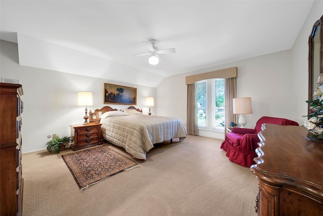 carpeted bedroom featuring ceiling fan and lofted ceiling