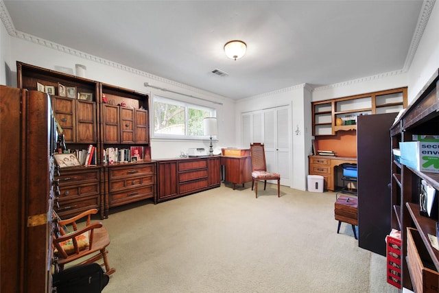 office featuring crown molding and light colored carpet