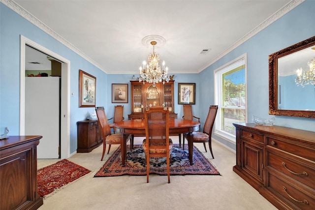 dining area with light carpet, crown molding, and a notable chandelier