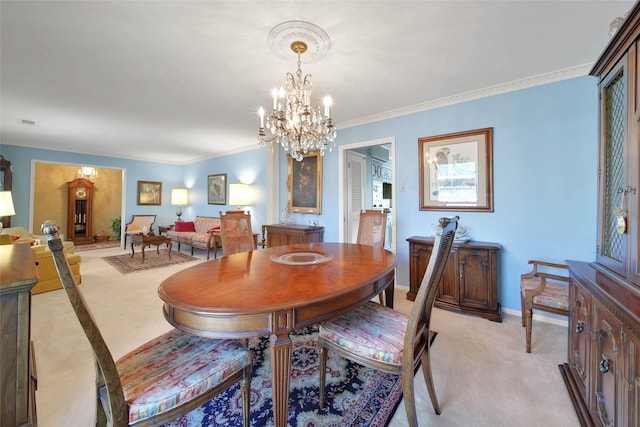 carpeted dining space with crown molding and a notable chandelier