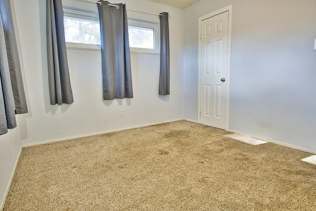 unfurnished room with carpet