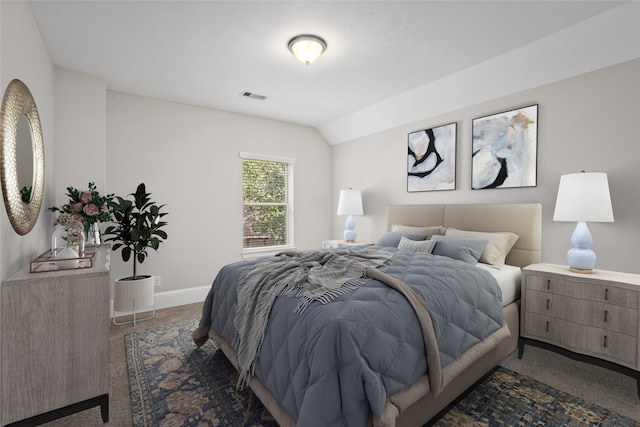 bedroom featuring lofted ceiling