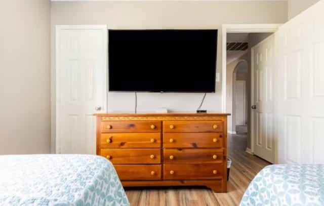 bedroom featuring light wood-type flooring