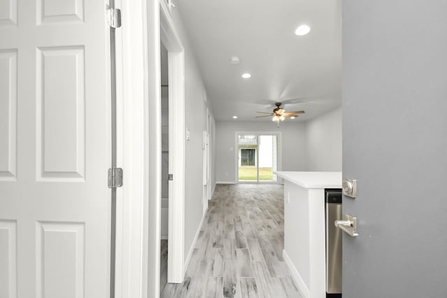 corridor featuring light hardwood / wood-style flooring