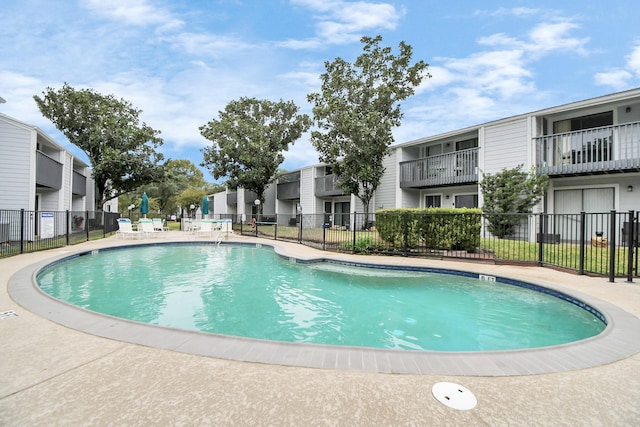 view of pool featuring a patio