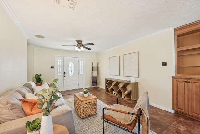 living room featuring a textured ceiling, ceiling fan, and crown molding