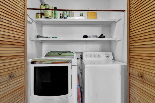 laundry room featuring separate washer and dryer