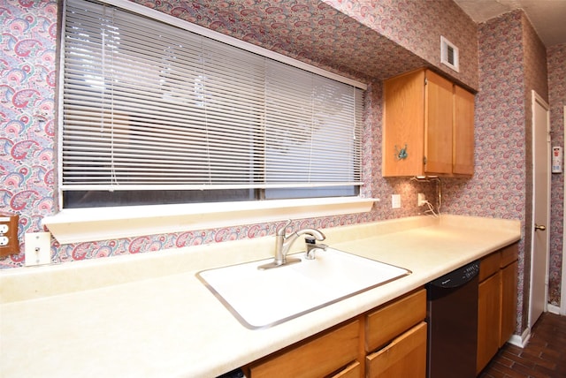 kitchen with dishwasher and sink