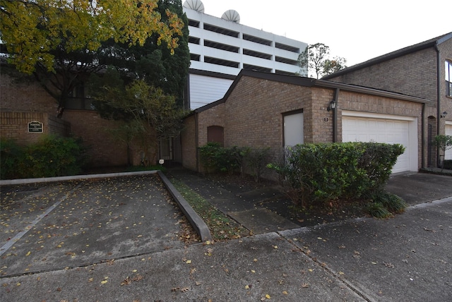 view of home's exterior featuring a garage