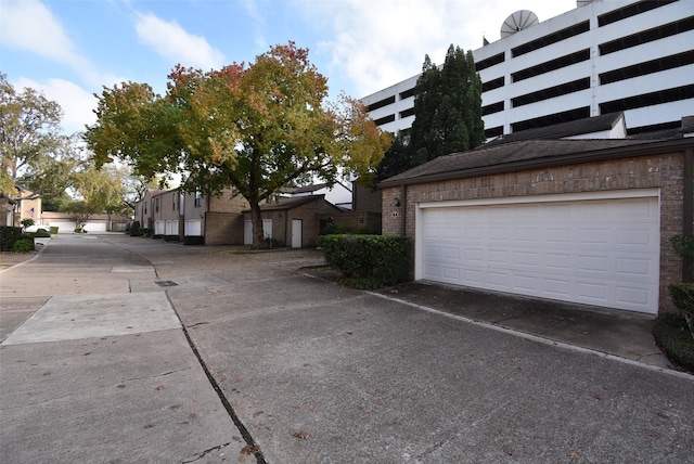 exterior space with a garage