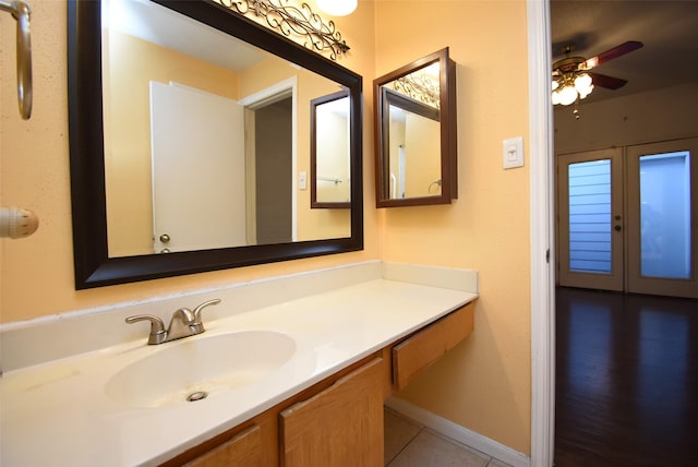 bathroom featuring french doors, vanity, tile patterned floors, and ceiling fan