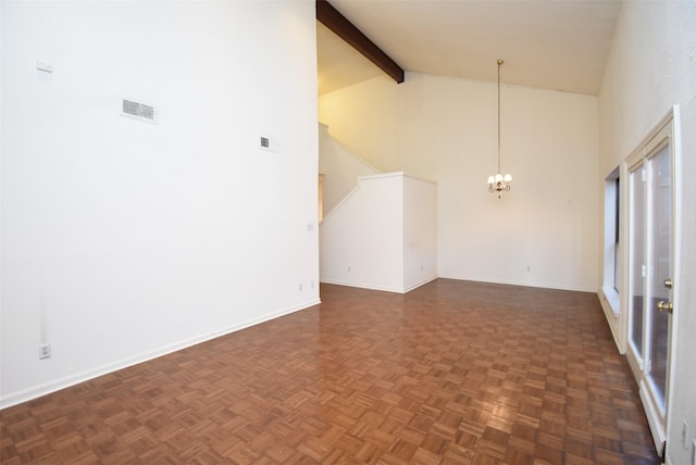 spare room featuring beam ceiling, dark parquet flooring, high vaulted ceiling, and a chandelier