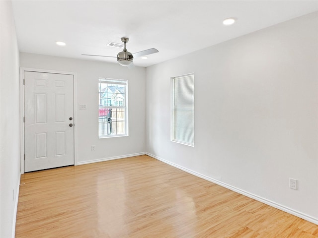 entryway featuring ceiling fan and light hardwood / wood-style flooring