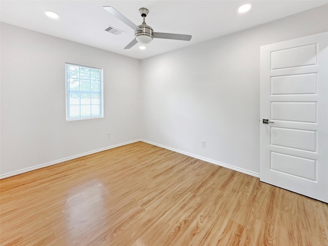 unfurnished room featuring light hardwood / wood-style floors and ceiling fan