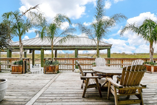 wooden terrace with a water view