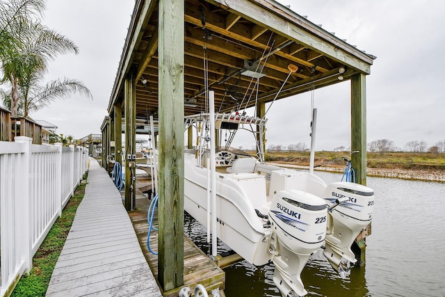 dock area featuring a water view