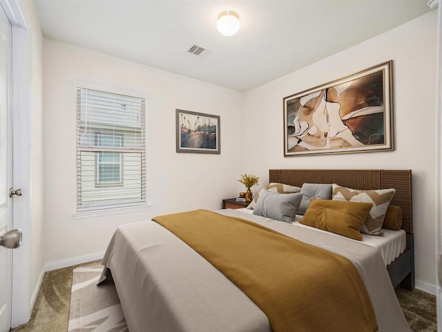 bedroom featuring carpet