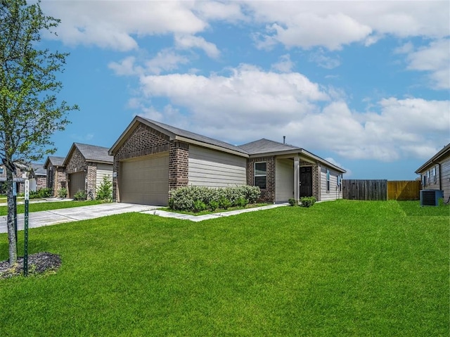 view of front facade with central air condition unit, a front lawn, and a garage