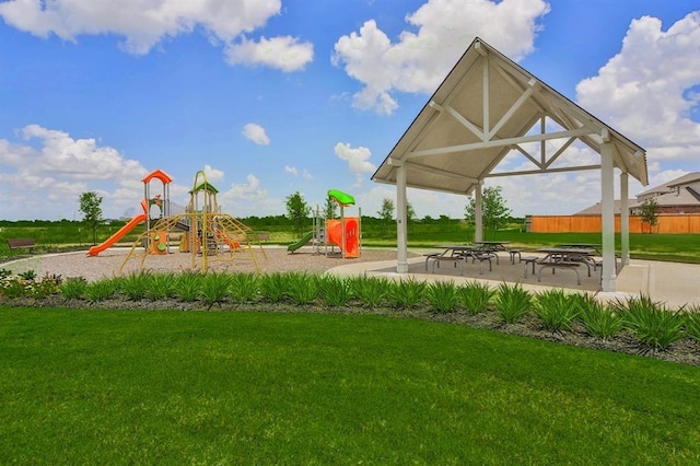 view of playground featuring a yard