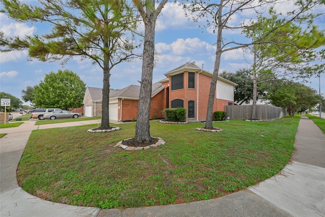 3102 Silver Cedar Trl, Katy, TX 77449 - view of front of property featuring brick siding, concrete driveway, and an attached garage