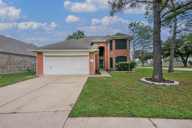 view of front facade with a garage and a front lawn