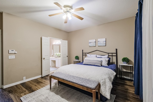 bedroom featuring a textured ceiling, ceiling fan, dark hardwood / wood-style floors, and ensuite bathroom