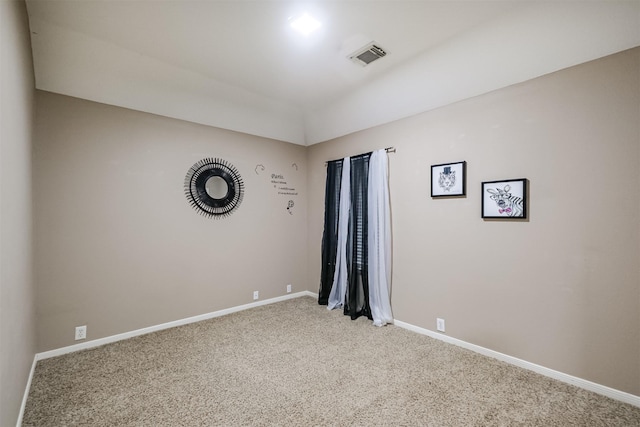 empty room with carpet flooring