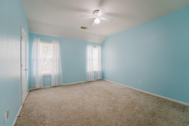 empty room with carpet flooring and ceiling fan