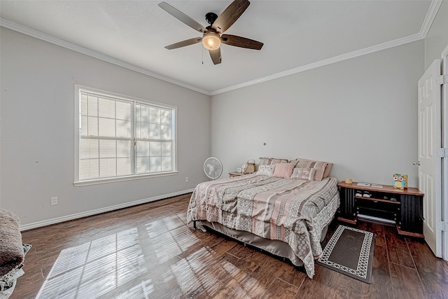 bedroom featuring hardwood / wood-style floors, crown molding, and ceiling fan