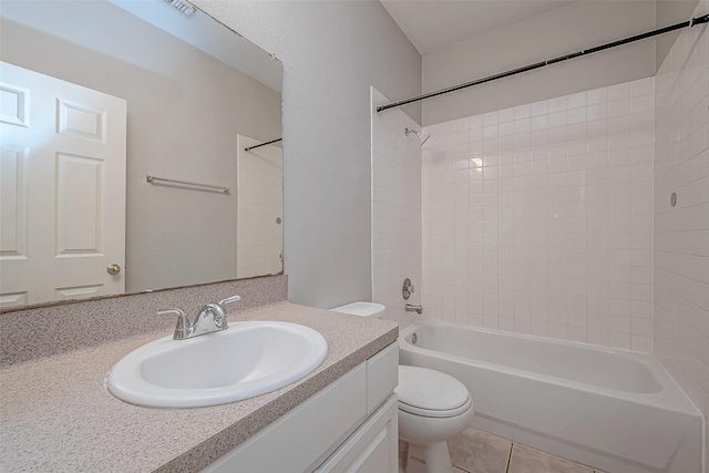 full bathroom with tile patterned floors,  shower combination, toilet, and vanity