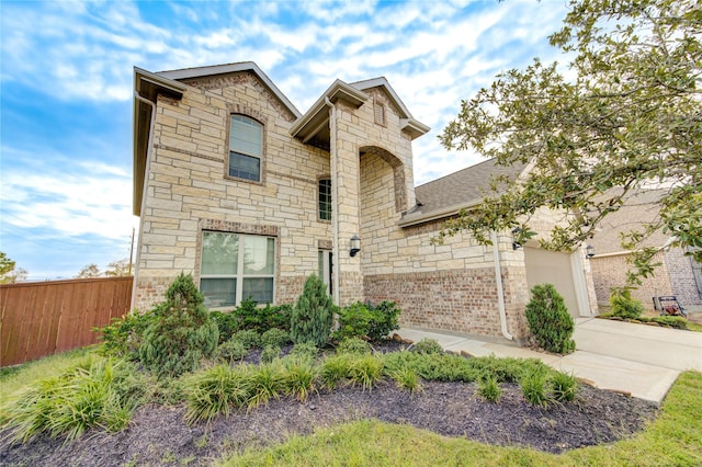 view of front of home with a garage