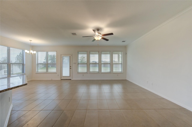 tiled empty room with ceiling fan with notable chandelier and crown molding