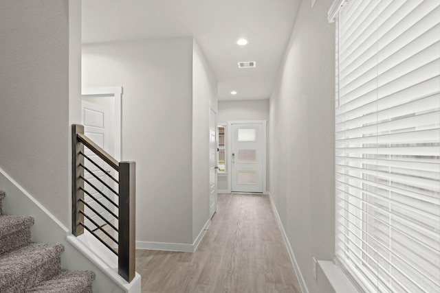 hallway featuring light hardwood / wood-style floors