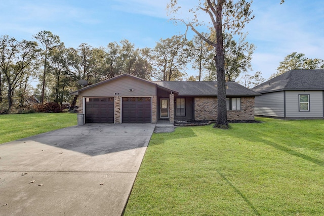 ranch-style home with a front yard and a garage