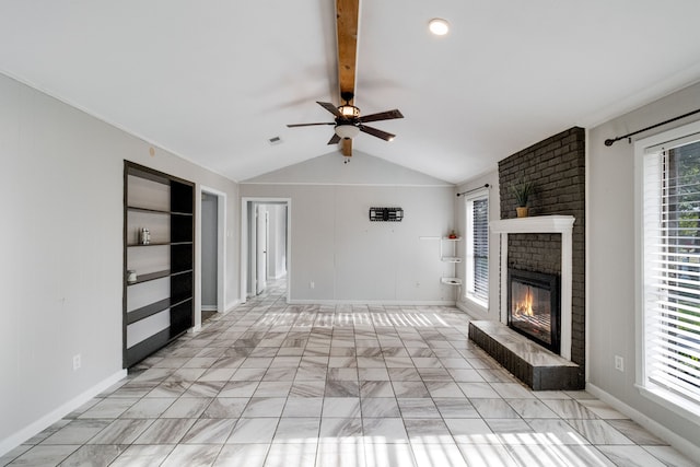 unfurnished living room with lofted ceiling with beams, ceiling fan, and a fireplace
