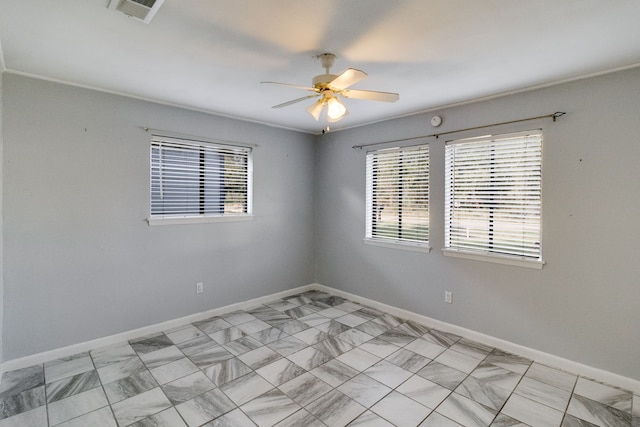 unfurnished room featuring ceiling fan