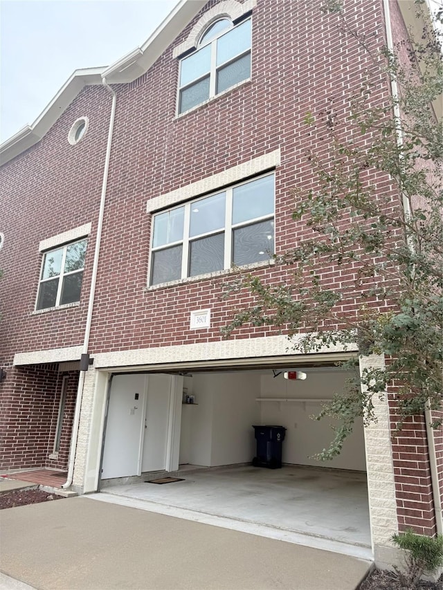 exterior space with a garage