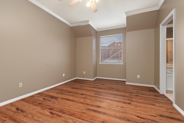 unfurnished bedroom with ceiling fan, crown molding, and wood-type flooring