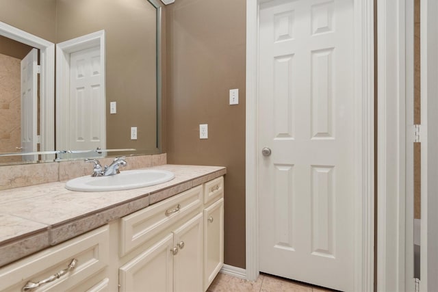 bathroom featuring tile patterned floors and vanity