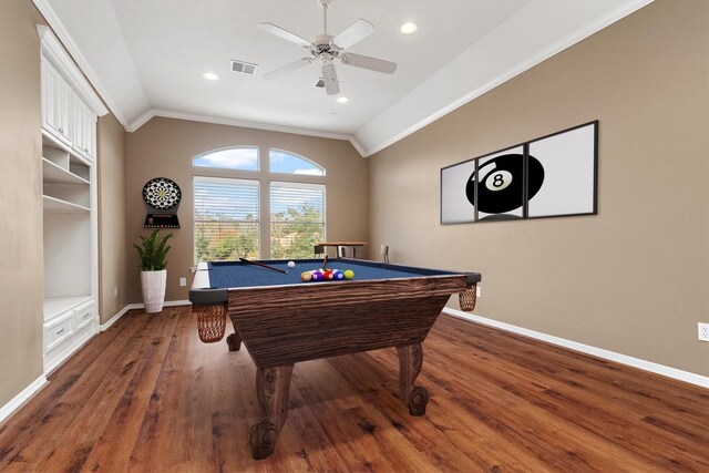 recreation room featuring ceiling fan, dark hardwood / wood-style floors, crown molding, vaulted ceiling, and pool table