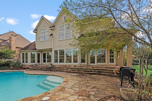 back of house featuring a patio area