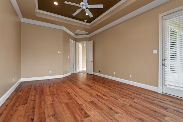 spare room featuring light hardwood / wood-style floors and ornamental molding