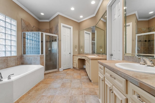 bathroom with vanity, separate shower and tub, and crown molding