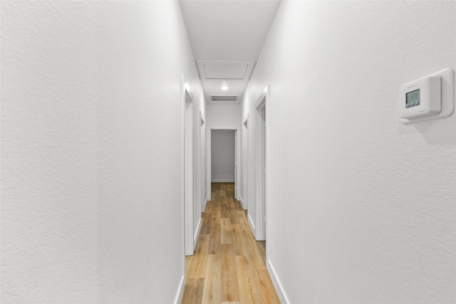 hall featuring light hardwood / wood-style flooring